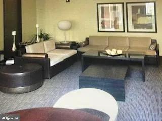 a living room with couches and furniture