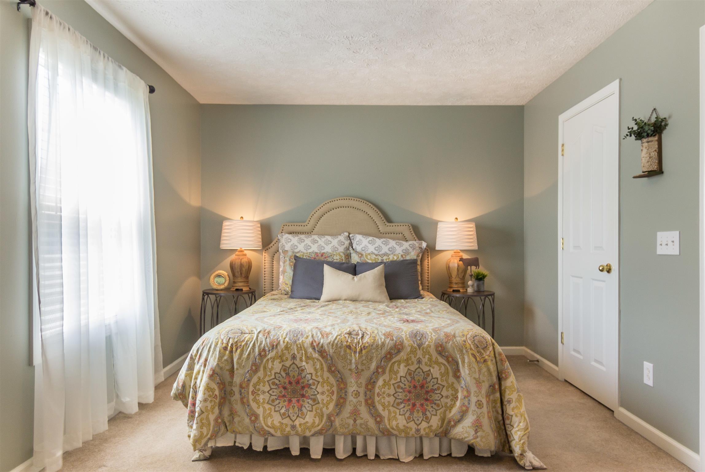 14136 Mt Pleasant Road Rockvale, TN 37153 - Photo 15 of 21 a bedroom with a bed and a window