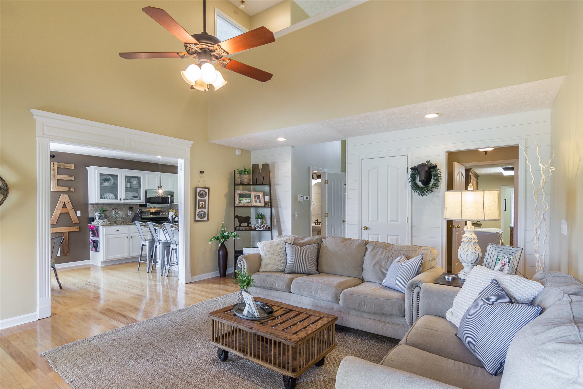 14136 Mt Pleasant Road Rockvale, TN 37153 - Photo 3 of 21 a living room with furniture and a chandelier