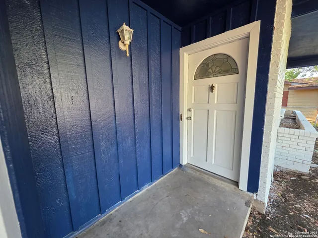 a view of front door with a door