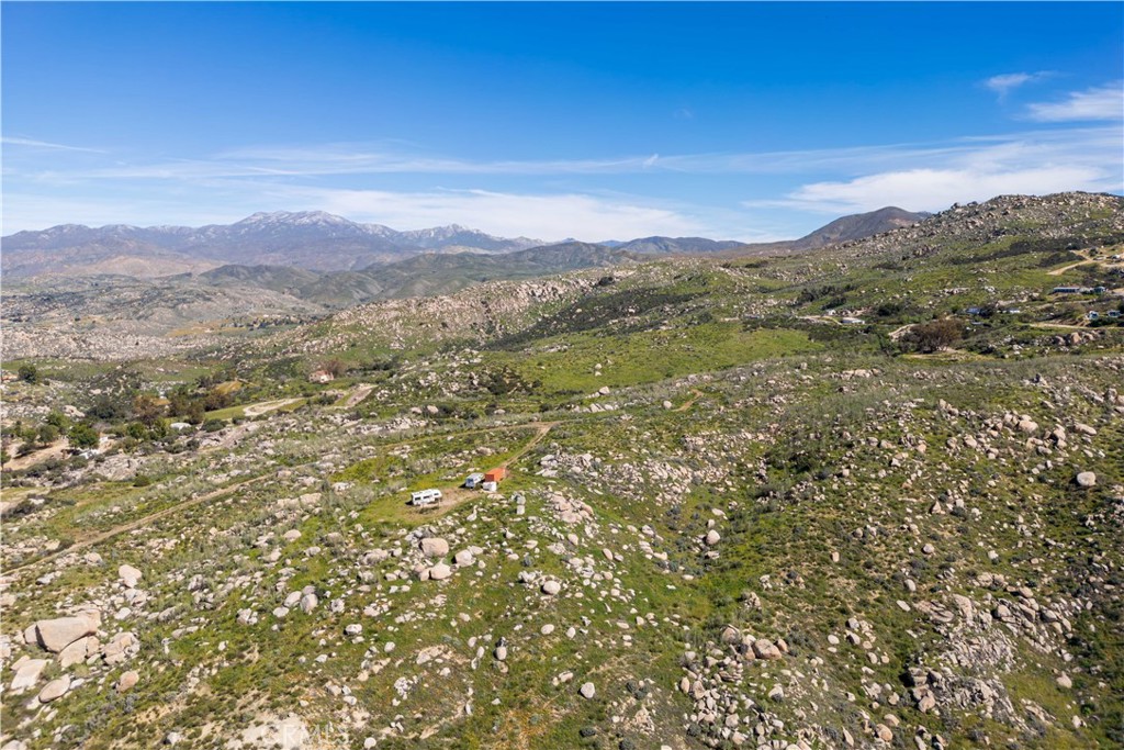 0 Webber Way Hemet, CA 92544 - Photo 13 of 33 a view of a lush green field with mountains in the background