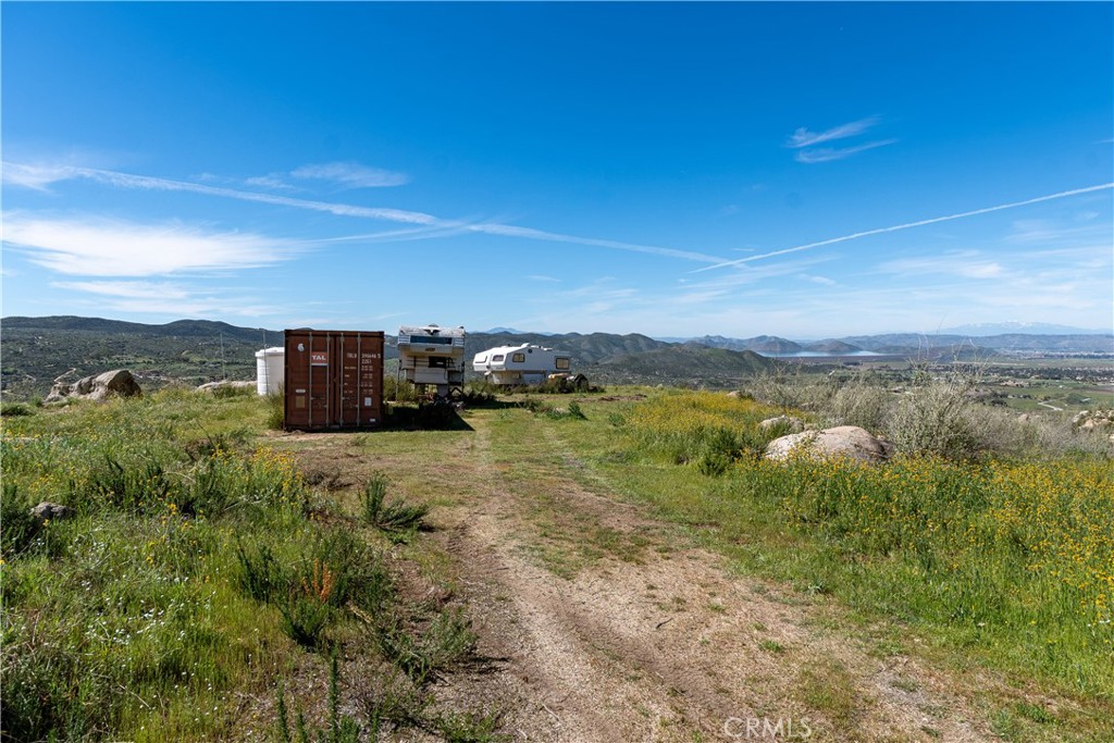 0 Webber Way Hemet, CA 92544 - Photo 19 of 33 a view of a dry yard with wooden fence