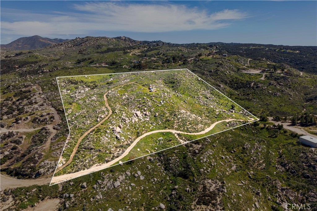 0 Webber Way Hemet, CA 92544 - Photo 2 of 33 a view of a swimming pool with a mountain