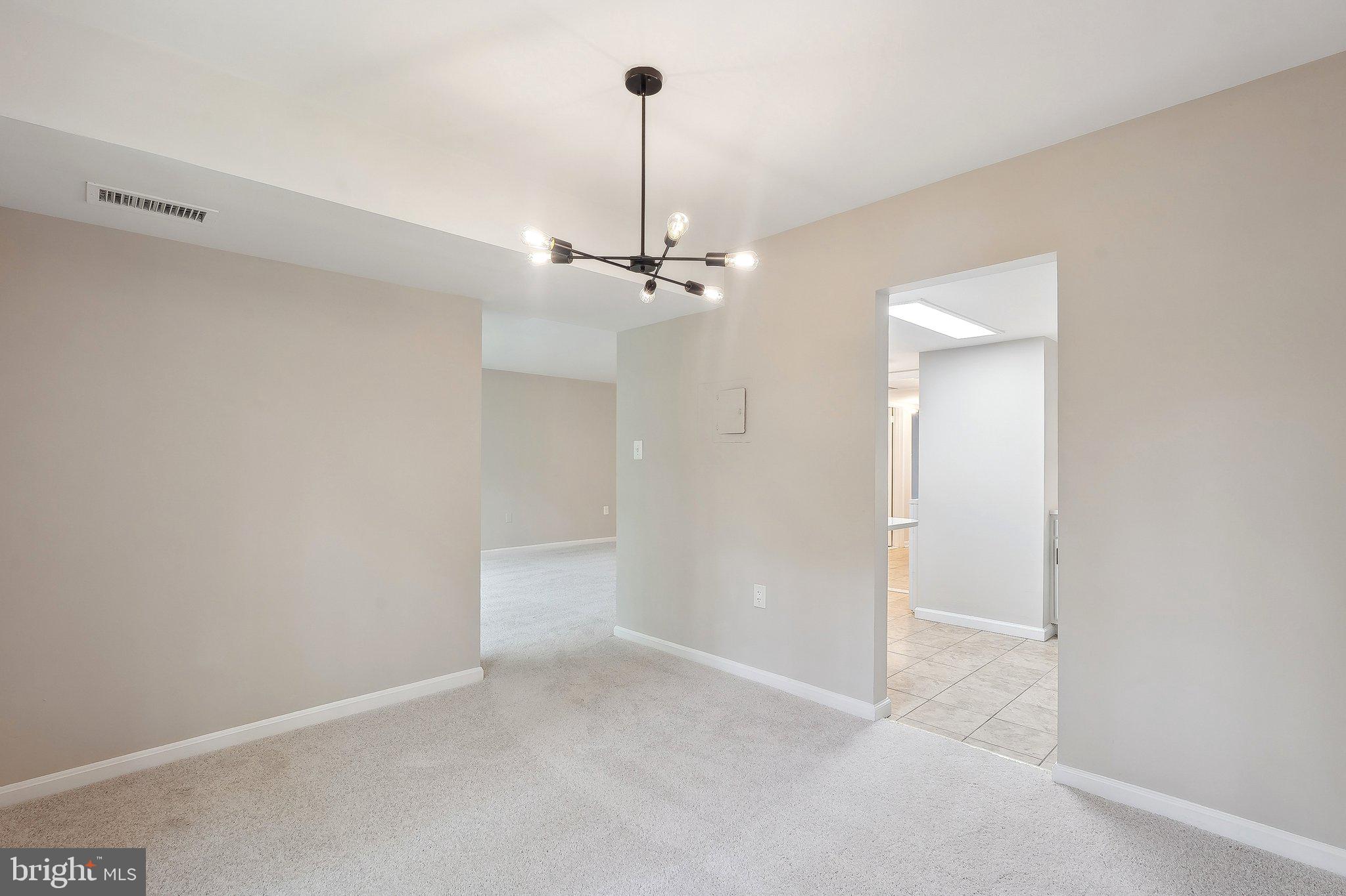 1531 Northgate Square, Unit 12B Reston, VA 20190 - Photo 13 of 34 a view of a room with a ceiling fan