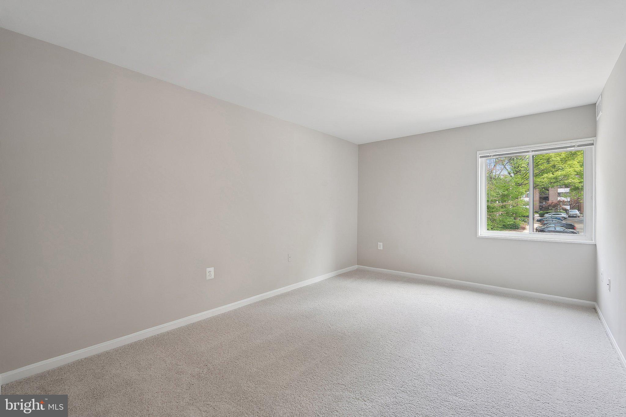 1531 Northgate Square, Unit 12B Reston, VA 20190 - Photo 17 of 34 an empty room with windows
