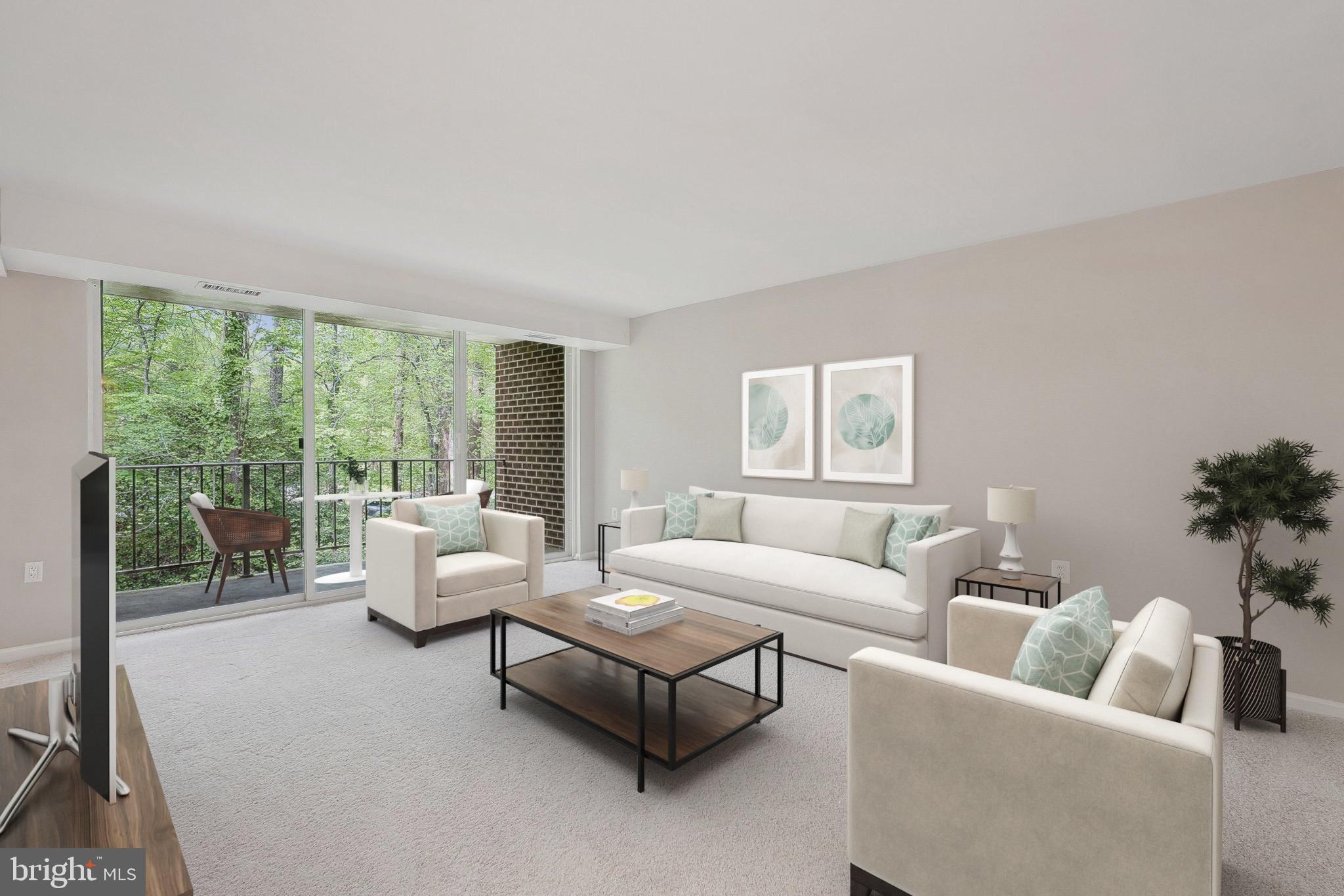 1531 Northgate Square, Unit 12B Reston, VA 20190 - Photo 2 of 34 a living room with furniture and a large window
