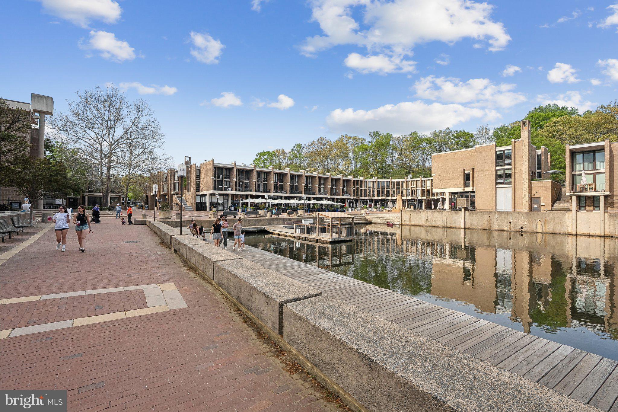 1531 Northgate Square, Unit 12B Reston, VA 20190 - Photo 30 of 34 a view of a lake with a houses