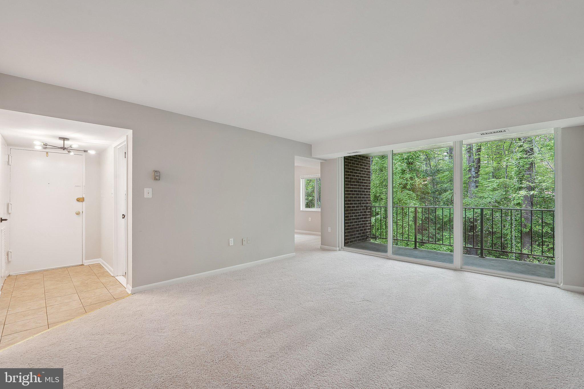 1531 Northgate Square, Unit 12B Reston, VA 20190 - Photo 4 of 34 a view of an empty room with a window