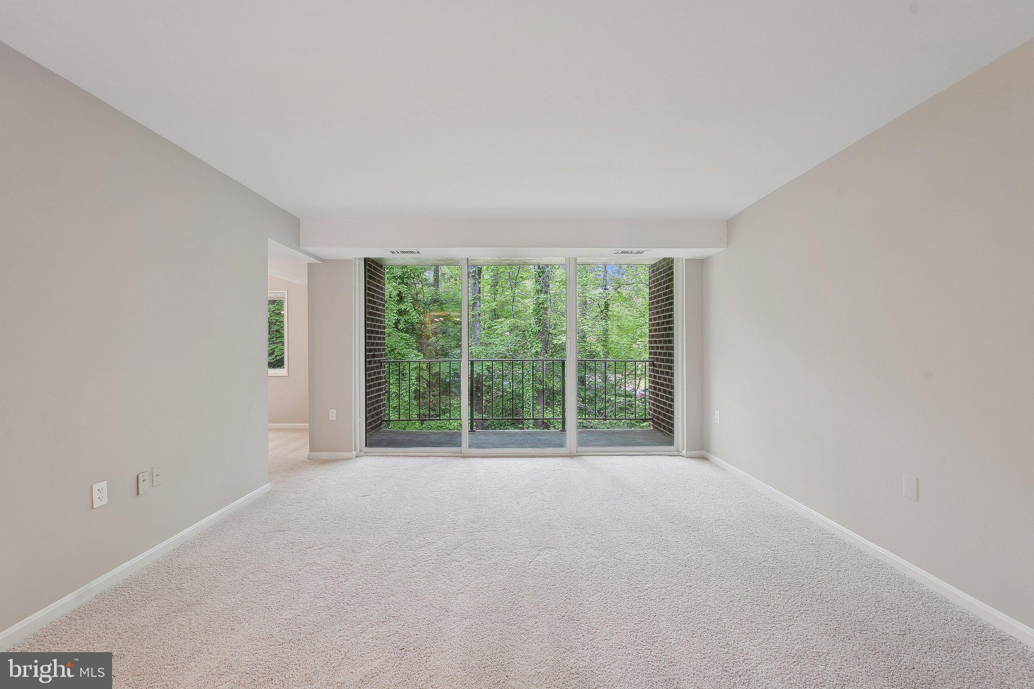 1531 Northgate Square, Unit 12B Reston, VA 20190 - Photo 5 of 34 a view of room with a large window