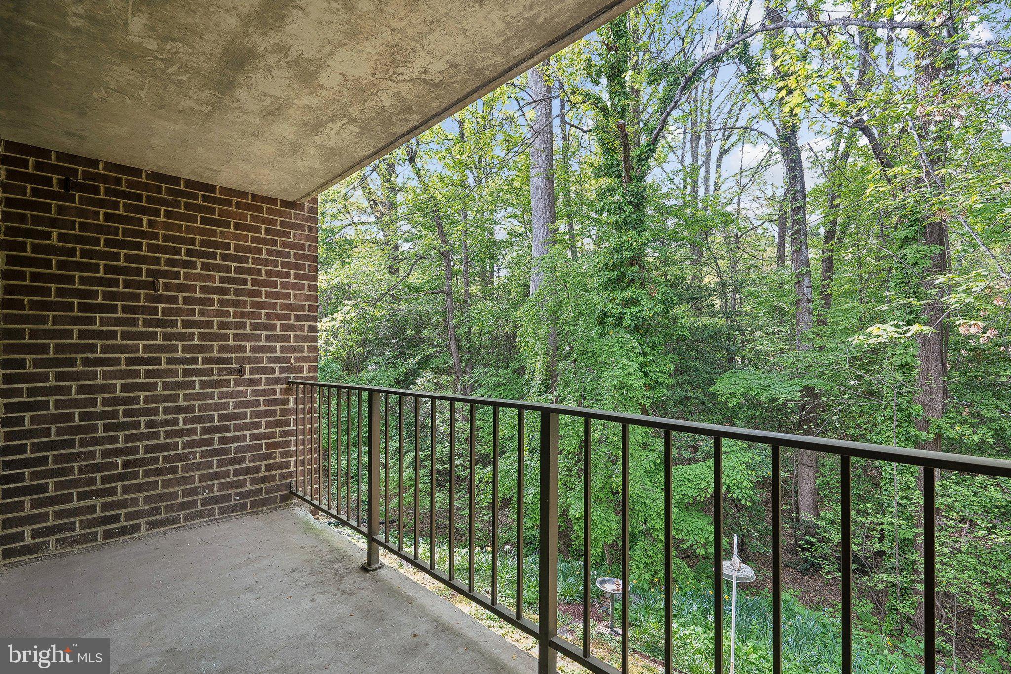 1531 Northgate Square, Unit 12B Reston, VA 20190 - Photo 8 of 34 a view of a balcony with trees