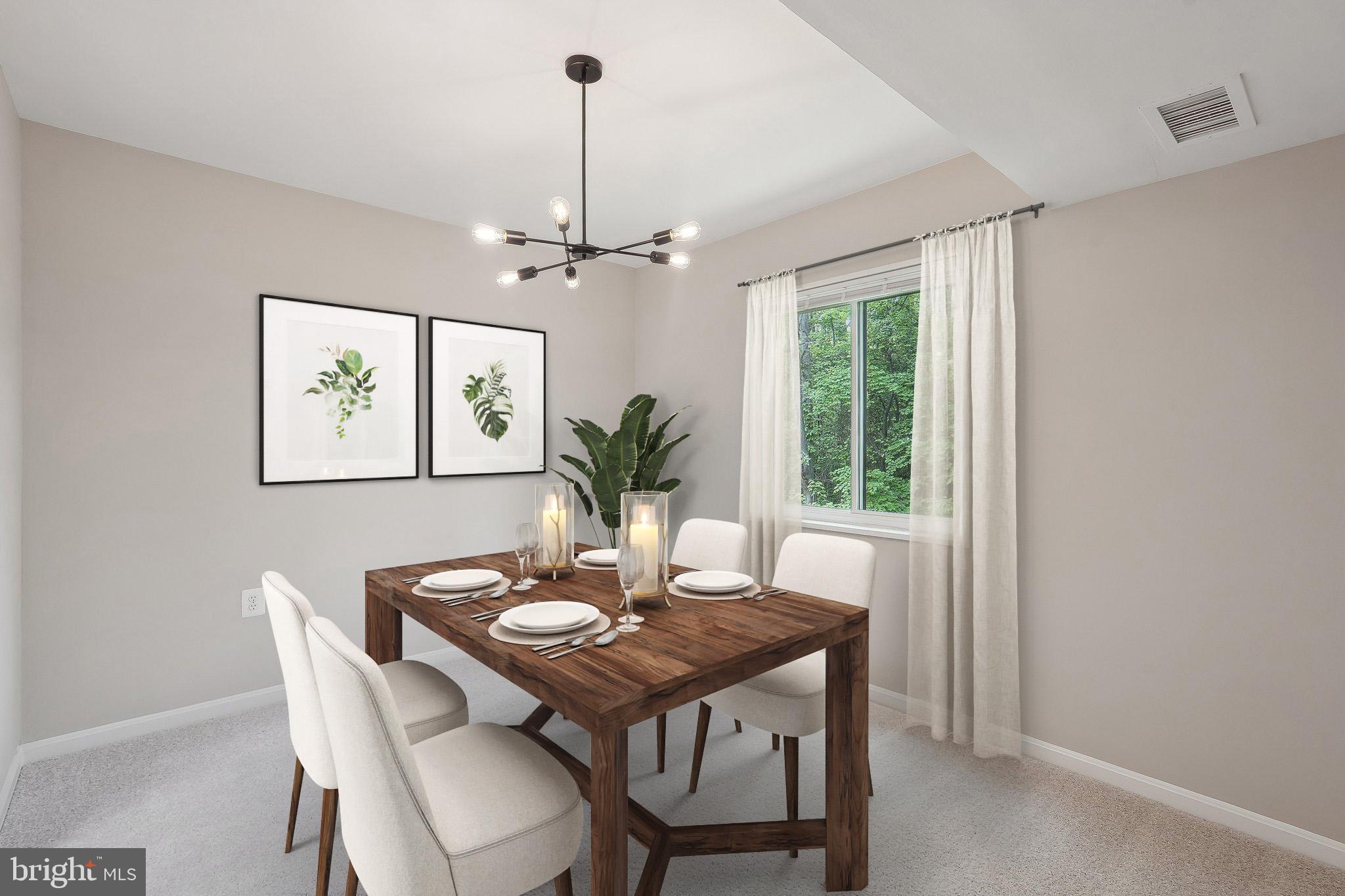 1531 Northgate Square, Unit 12B Reston, VA 20190 - Photo 10 of 34 a view of a dining room with furniture window and wooden floor