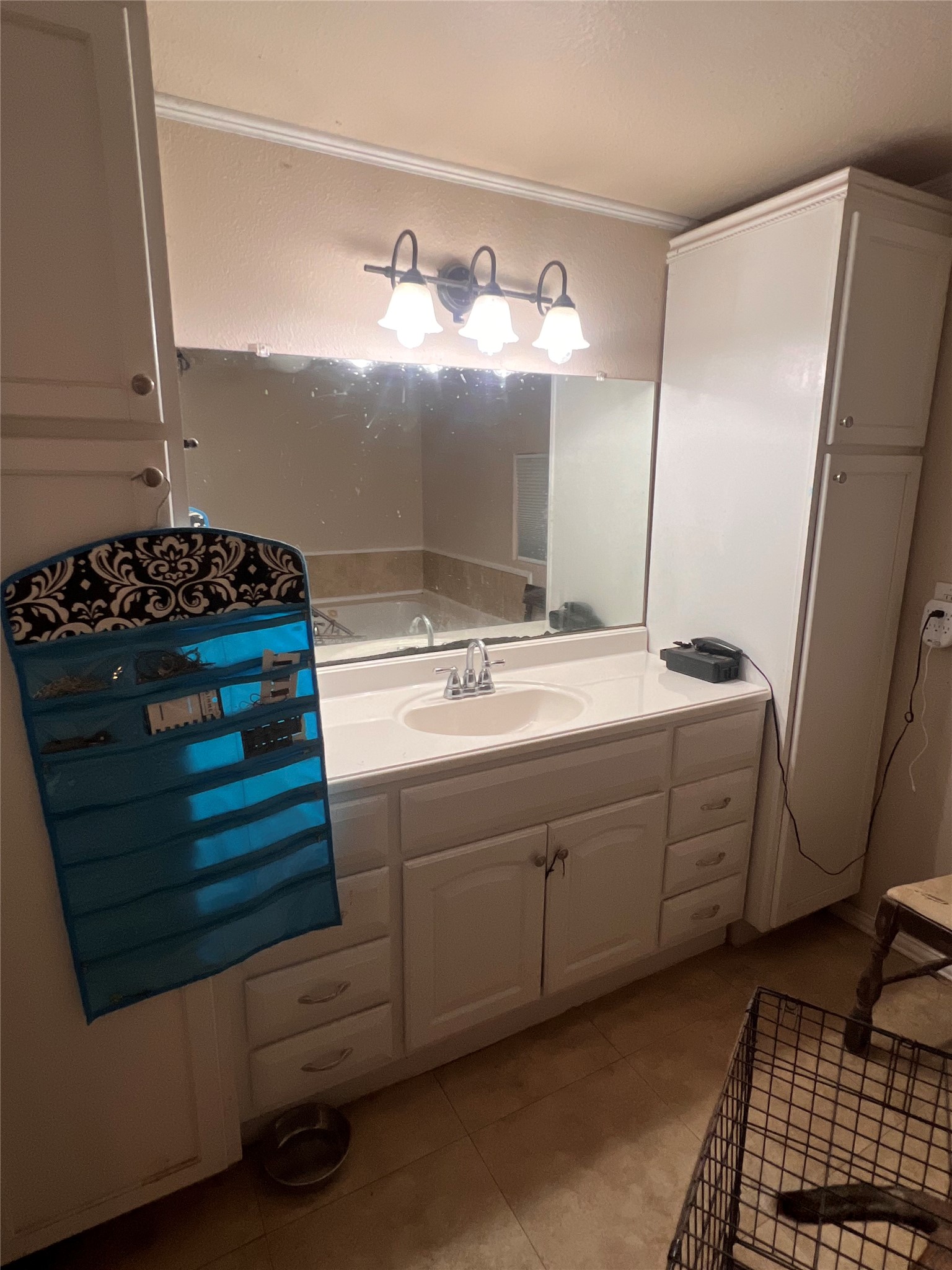 513 Scott Street Tye, TX 79563 - Photo 10 of 16 a bathroom with a double vanity sink and a mirror