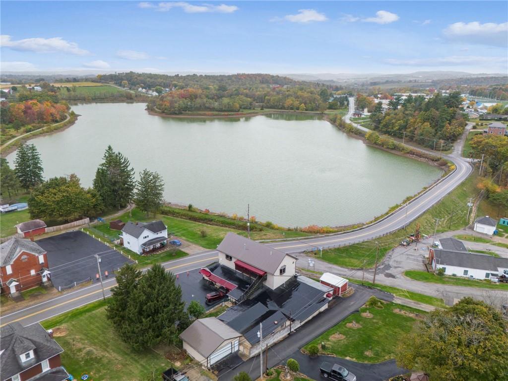 608 North Chestnut Street Derry, PA 15627 - Photo 2 of 50 an aerial view of a house with pool lake view and mountain view