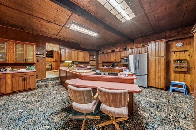 a kitchen with a stove and a sink
