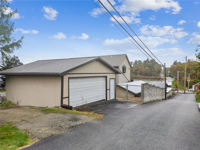 a dining area with a lots of wooden furniture