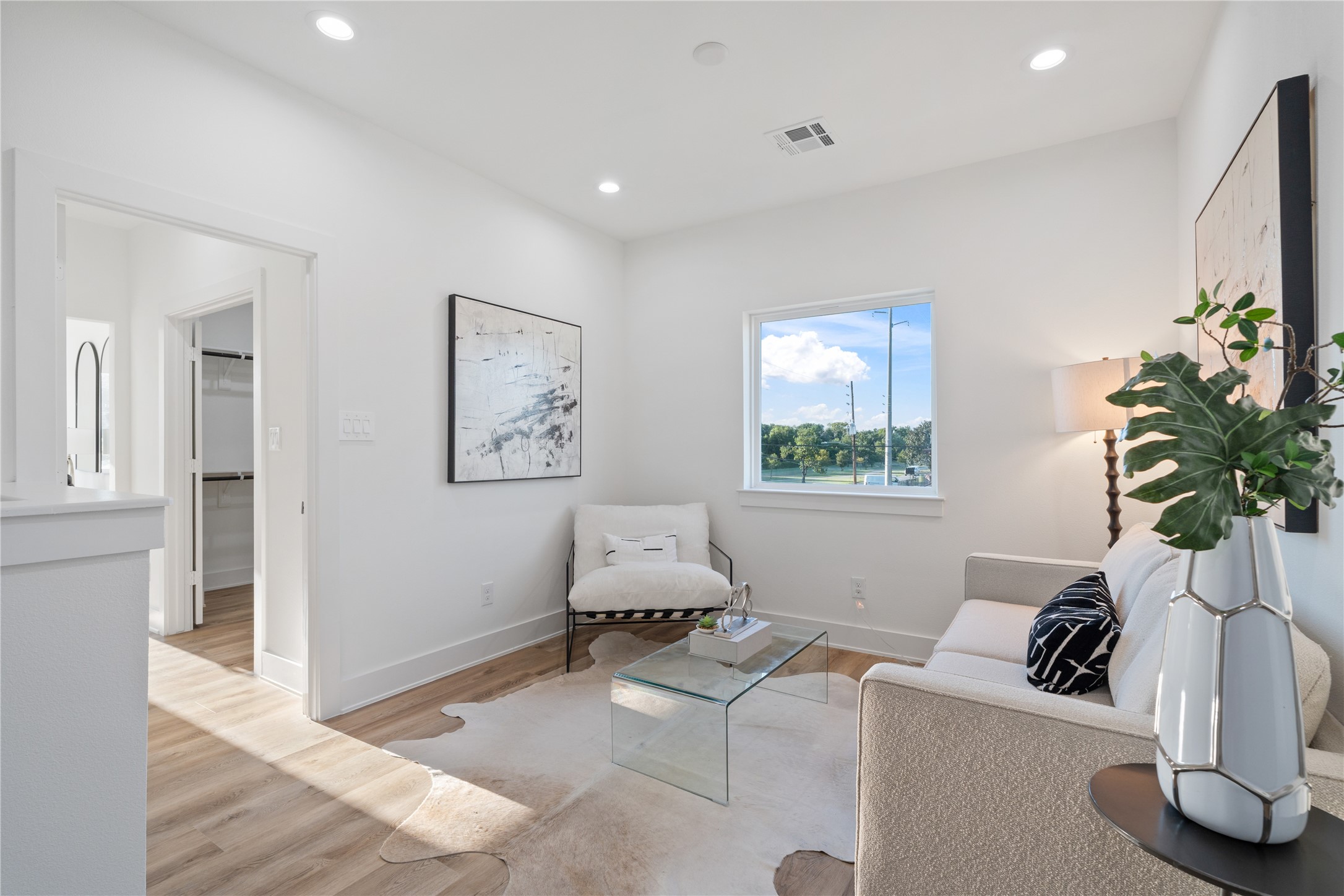 9003 Comal Street Houston, TX 77051 - Photo 20 of 36 This upstairs flexible space creates the perfect separation between the primary suite and secondary bedrooms. It offers privacy while still maintaining connectivity within the home. The design enhances both comfort and functionality for family living.