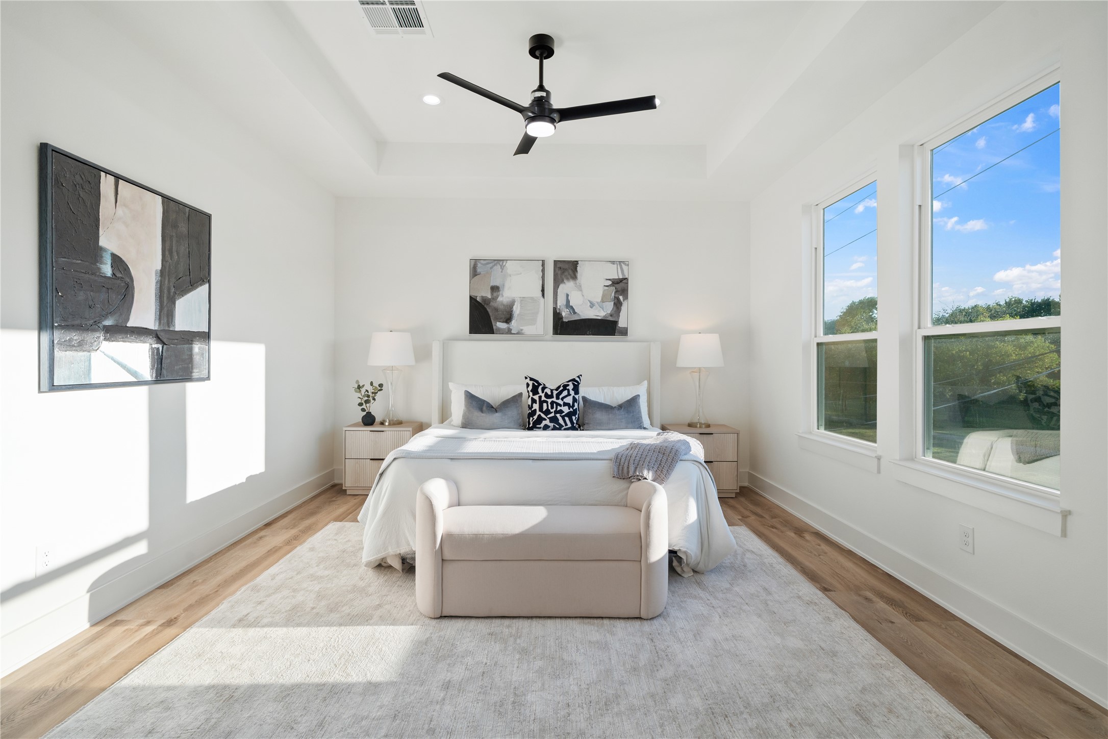 9003 Comal Street Houston, TX 77051 - Photo 22 of 36 The primary suite offers impressive depth and space, giving it a grand and luxurious feel. Its expansive layout creates a serene retreat where comfort and style come together effortlessly. Every detail enhances the sense of openness and elegance in this private sanctuary.