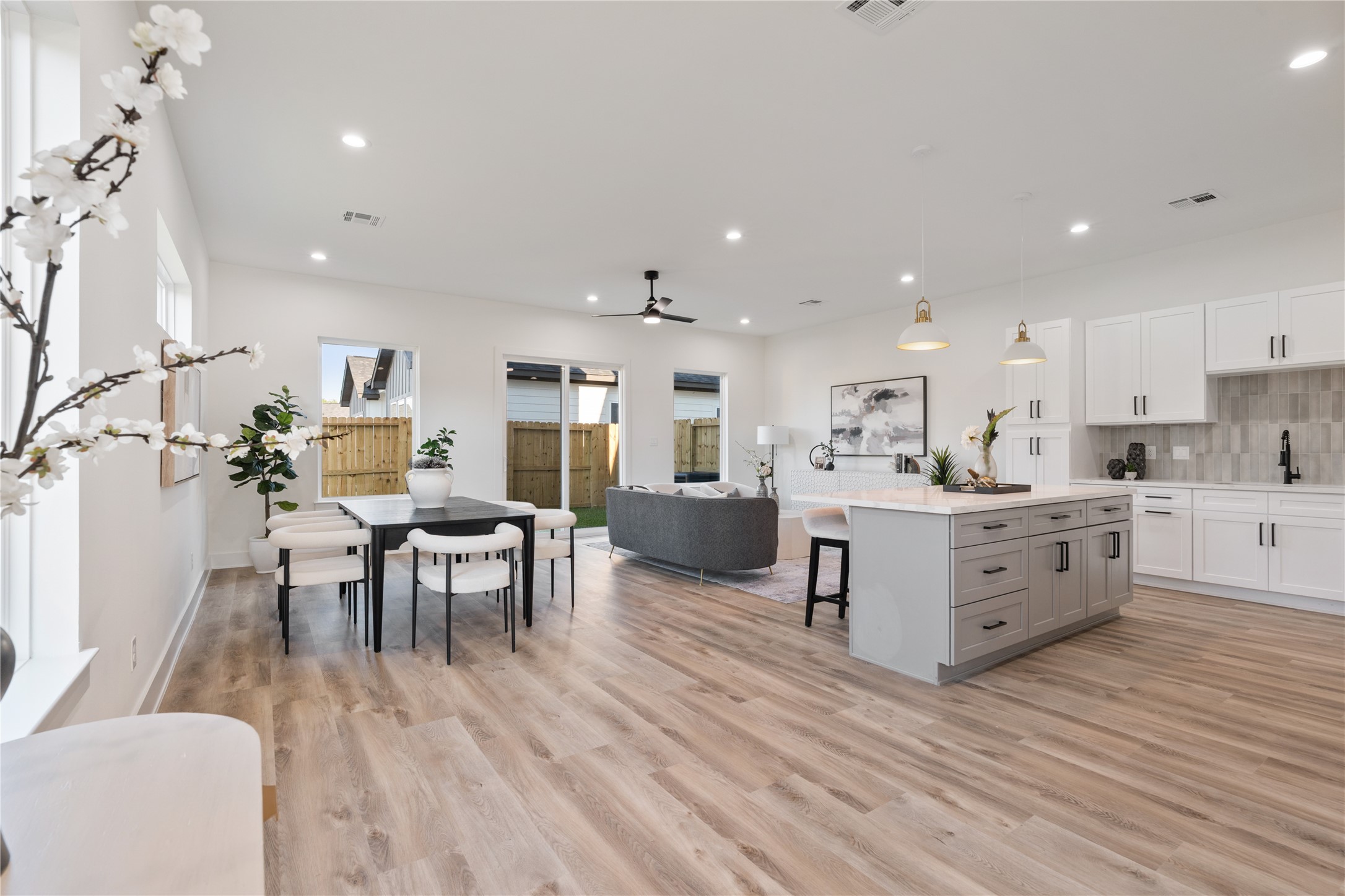 9003 Comal Street Houston, TX 77051 - Photo 3 of 36 The first floor offers a huge living area, providing plenty of space for family gatherings, entertaining, or everyday life. Its open layout ensures effortless flow between rooms while maintaining a cozy, inviting atmosphere. This expansive space makes it easy to imagine your life unfolding comfortably here.