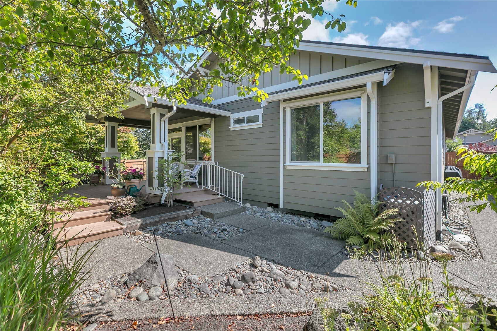 4961 Spokane Street Northeast Lacey, WA 98516 - Photo 30 of 38 a front view of a house with garden