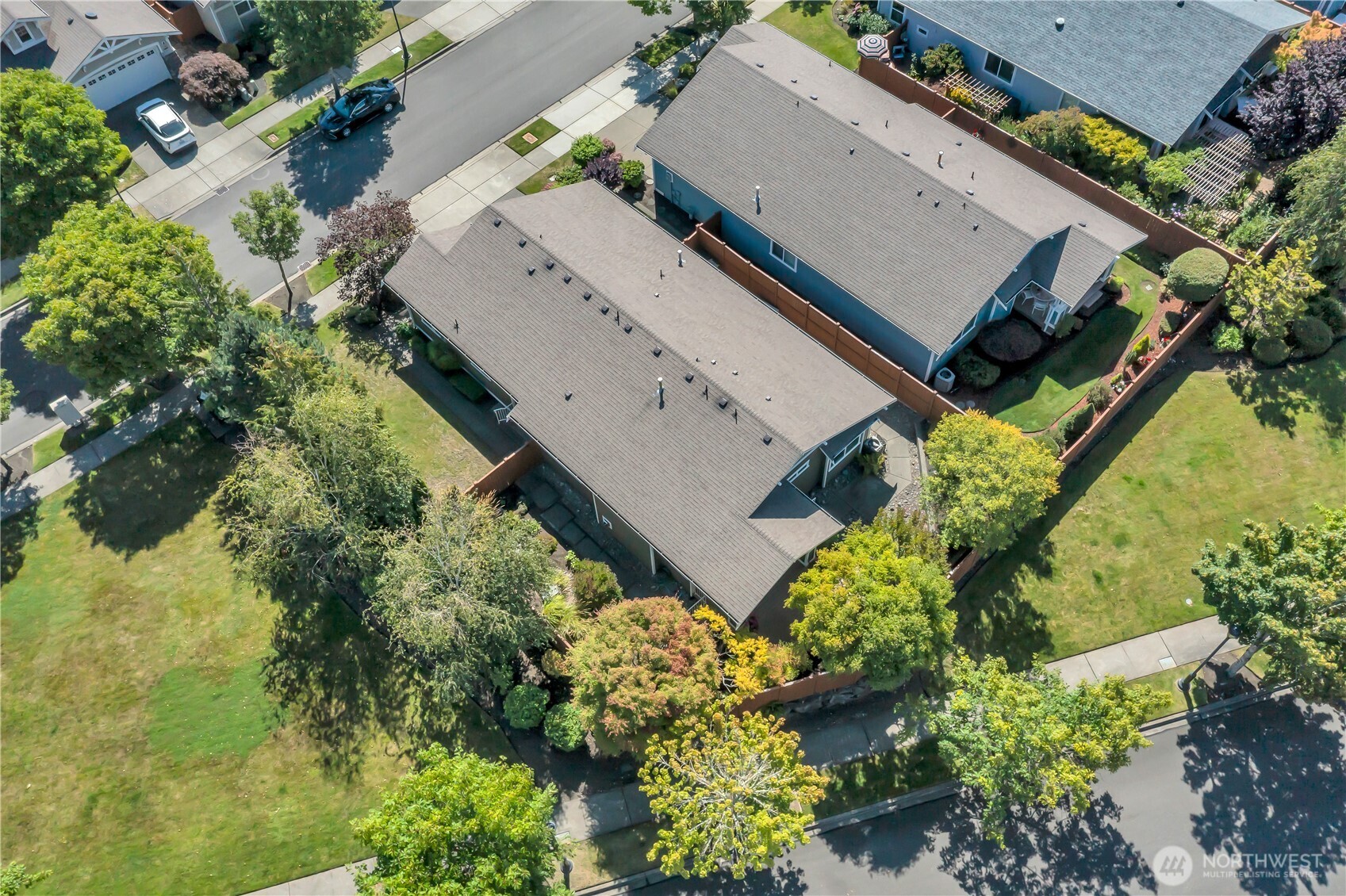 4961 Spokane Street Northeast Lacey, WA 98516 - Photo 36 of 38 an aerial view of a house with a yard