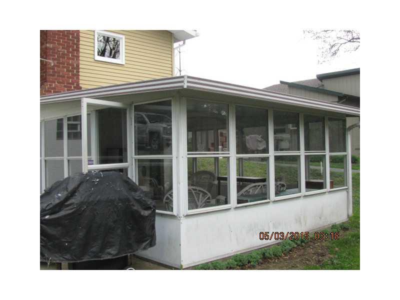 3303 Heights Road Aliquippa, PA 15001 - Photo 6 of 21 Exterior Back. Back Sun Room