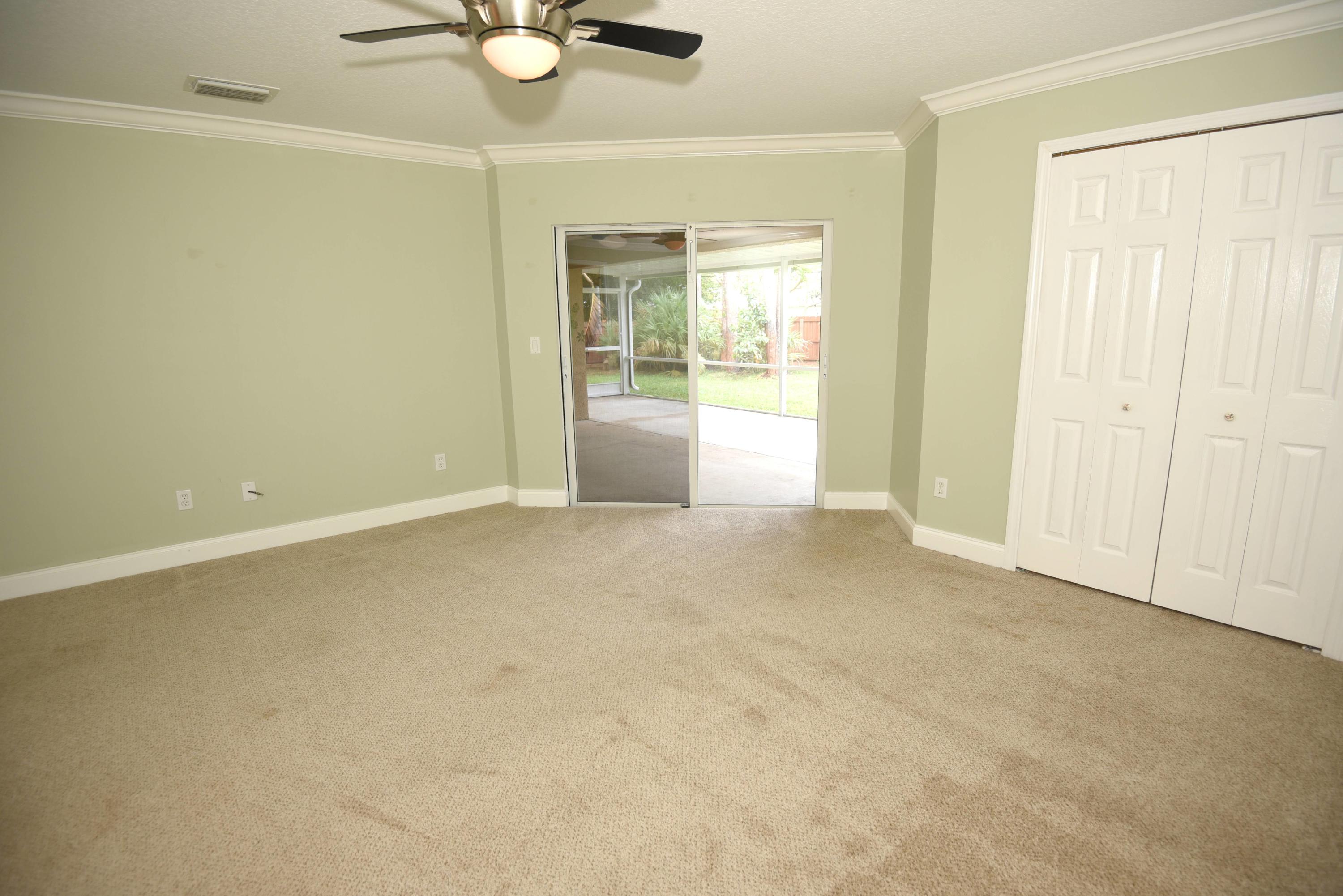 2438 Southwest Independence Road Port St. Lucie, FL 34953 - Photo 14 of 28 2438 SW Independence Road Master Bedroom