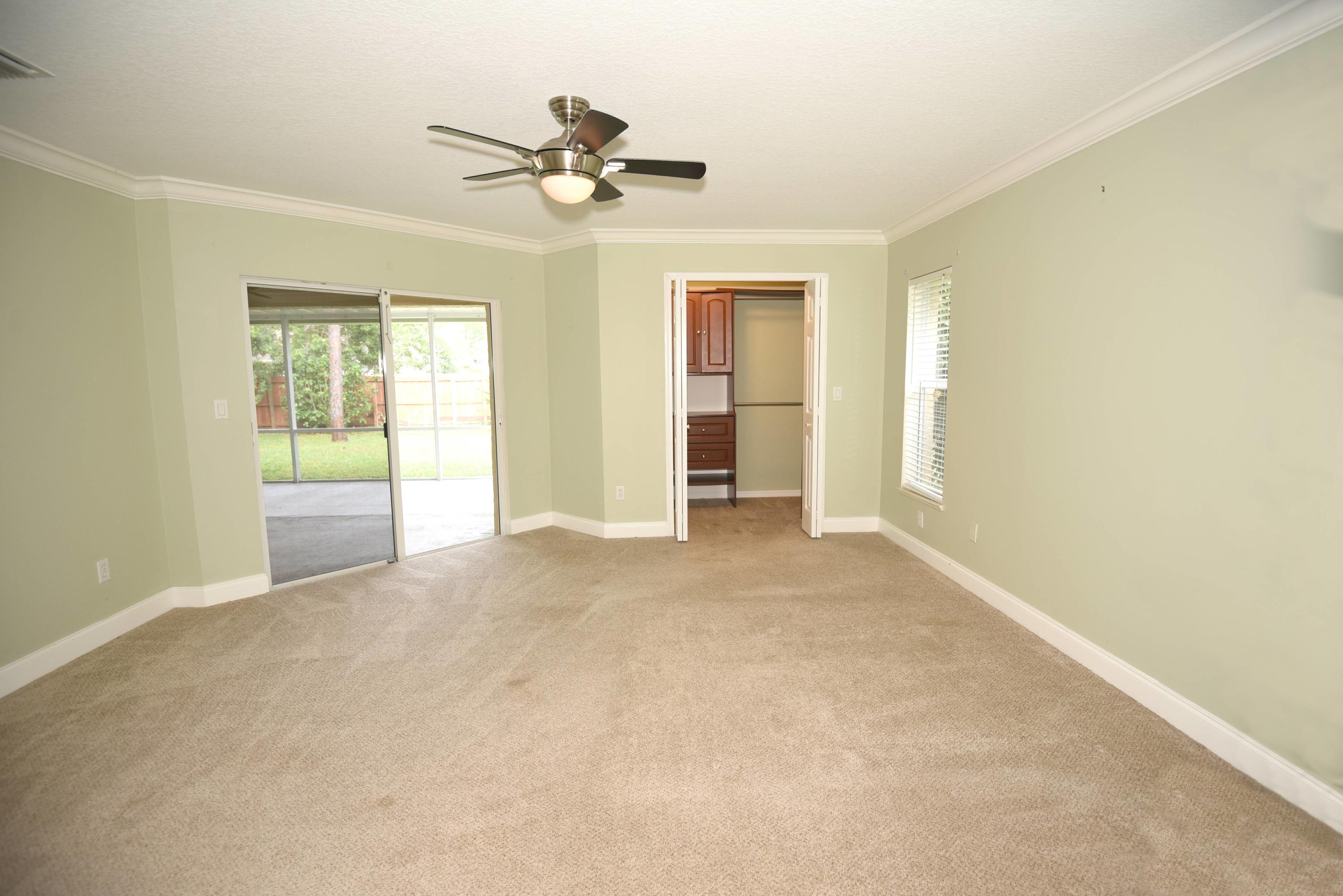 2438 Southwest Independence Road Port St. Lucie, FL 34953 - Photo 15 of 28 2438 SW Independence Road Master Bedroom