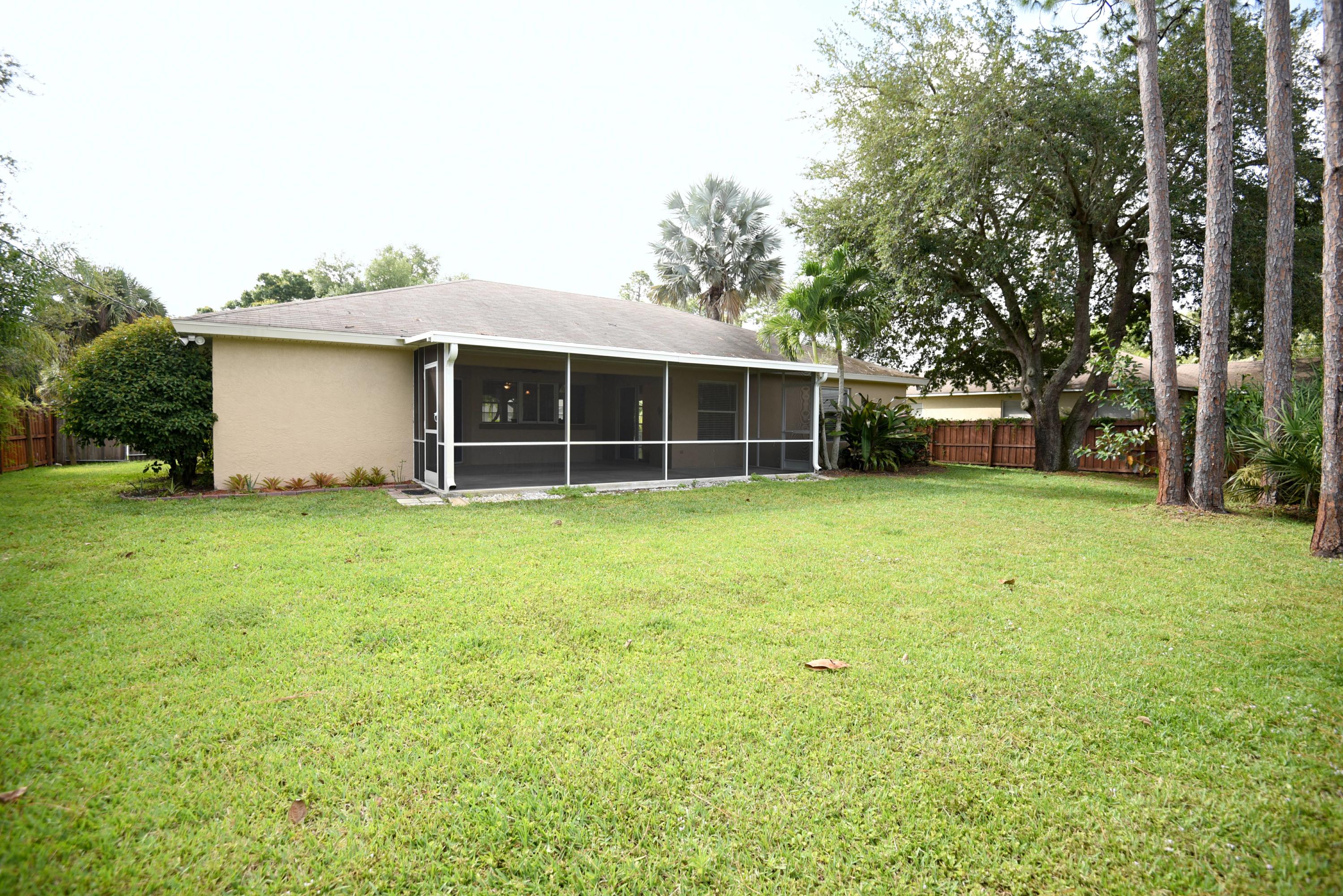 2438 Southwest Independence Road Port St. Lucie, FL 34953 - Photo 23 of 28 2438 SW Independence Road Back Yard 1