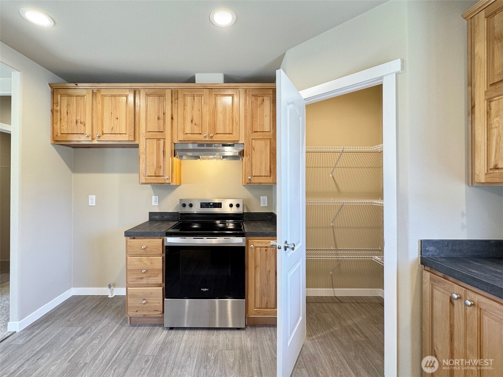 41 Butterfly Lane Pacific Beach, WA 98571 - Photo 14 of 37 a kitchen with a stove and a sink