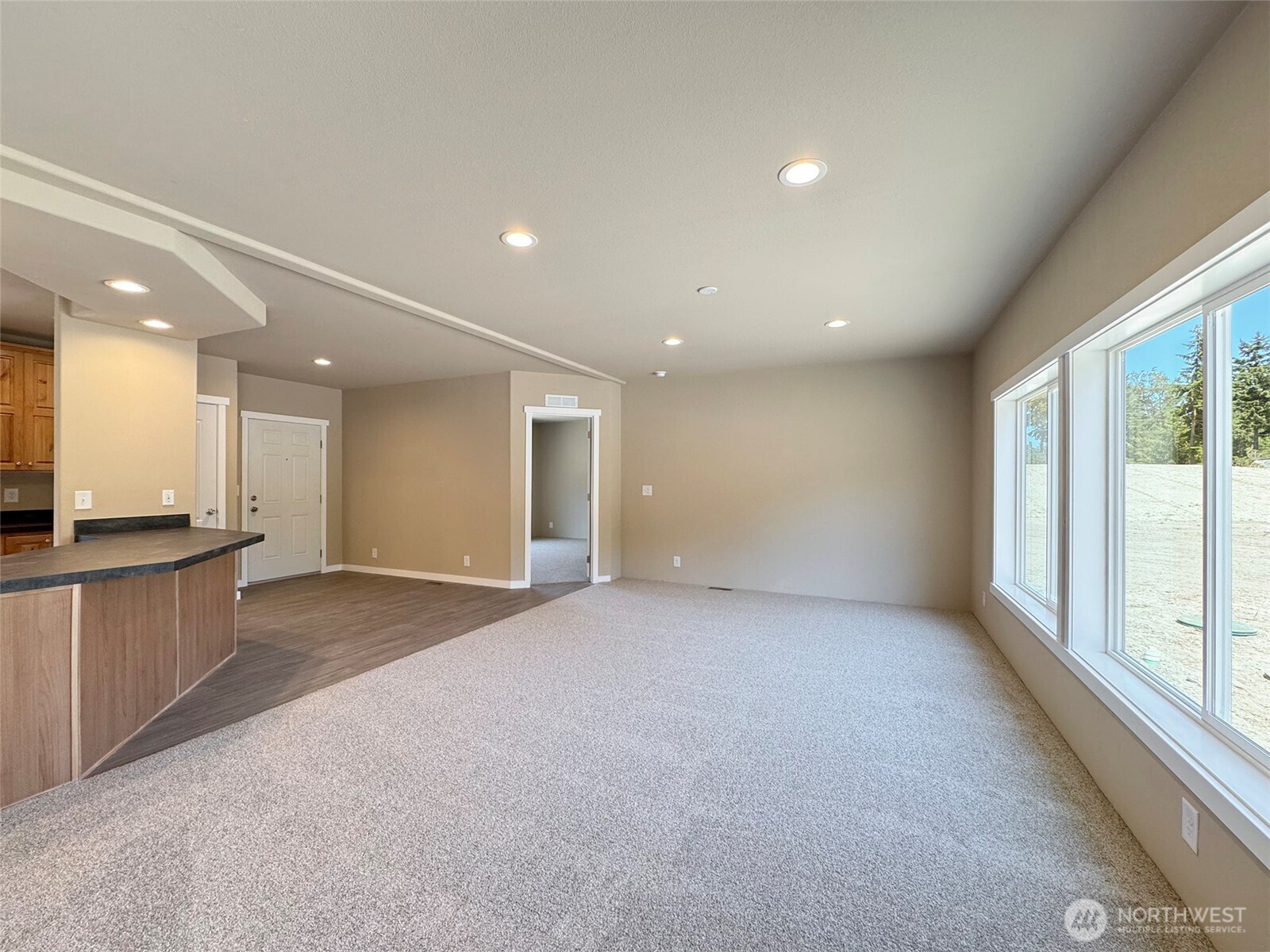 41 Butterfly Lane Pacific Beach, WA 98571 - Photo 17 of 37 a view of an empty room with a window