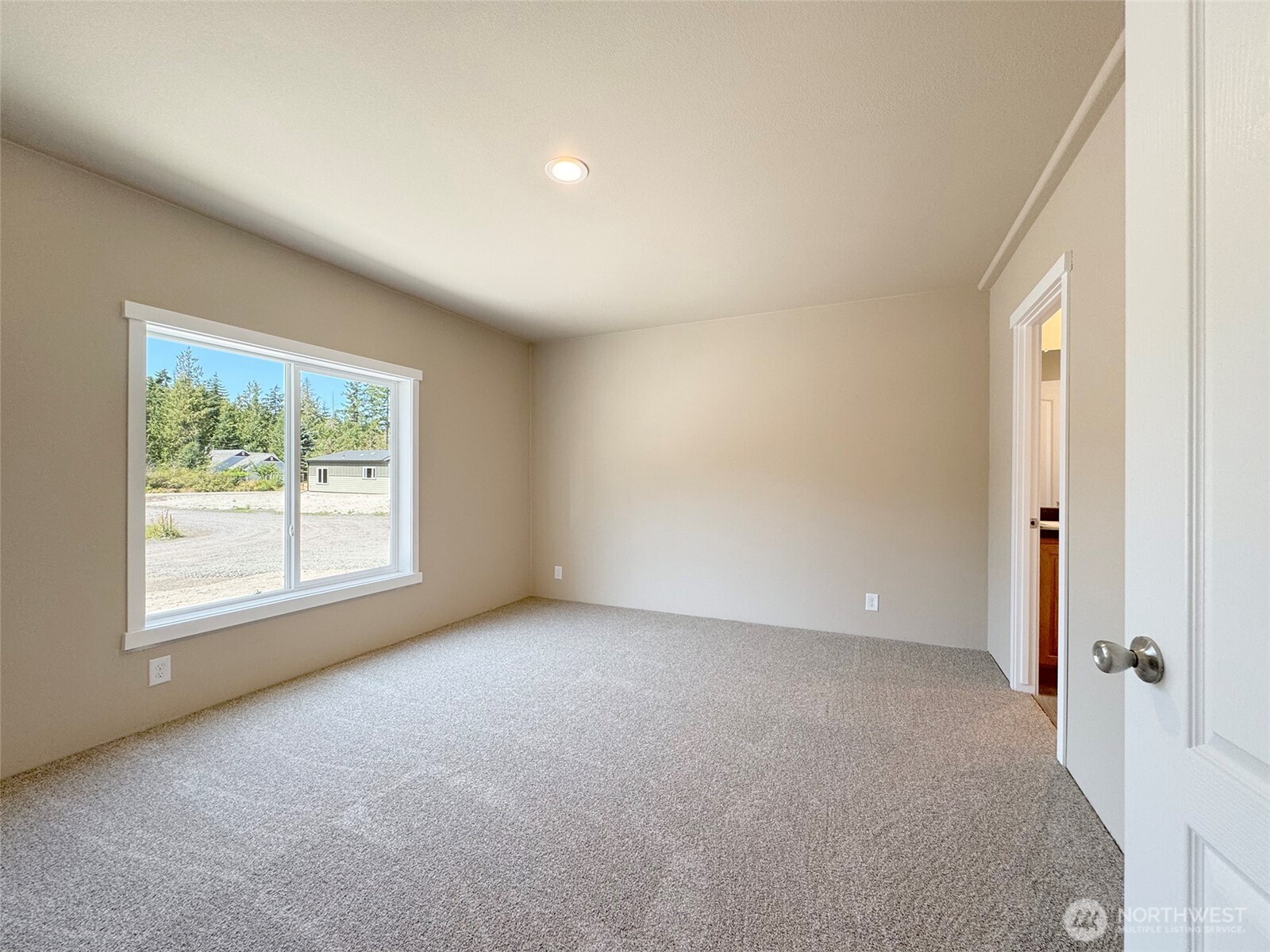 41 Butterfly Lane Pacific Beach, WA 98571 - Photo 18 of 37 an empty room with windows and closet