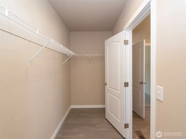 a bathroom with sink and mirror
