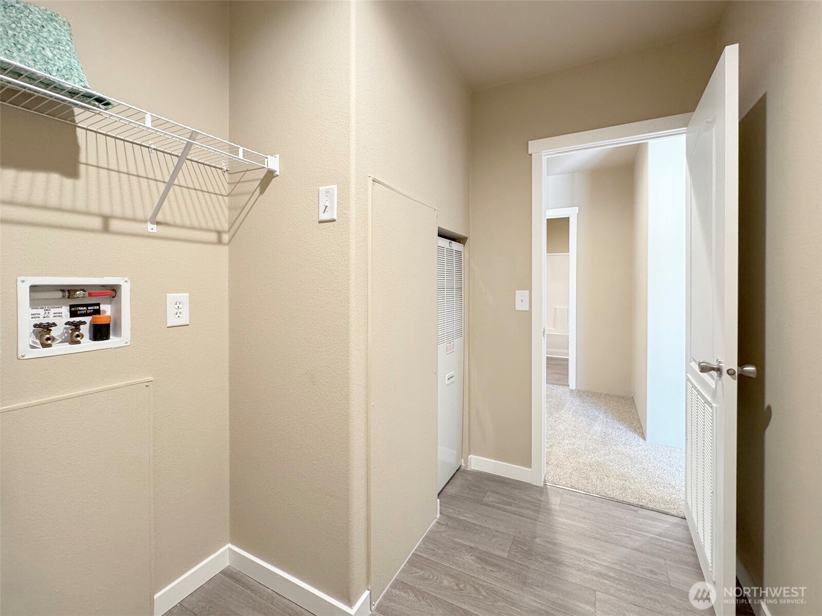 41 Butterfly Lane Pacific Beach, WA 98571 - Photo 33 of 37 a view of a hallway with wooden floor and closet