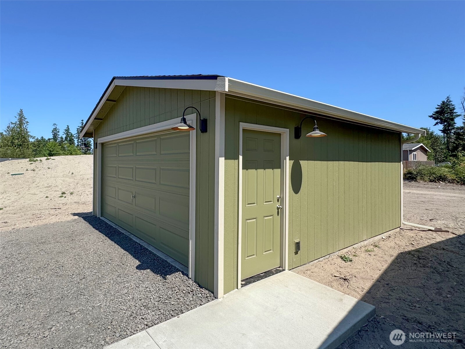 41 Butterfly Lane Pacific Beach, WA 98571 - Photo 37 of 37 a front view of a house with parking space