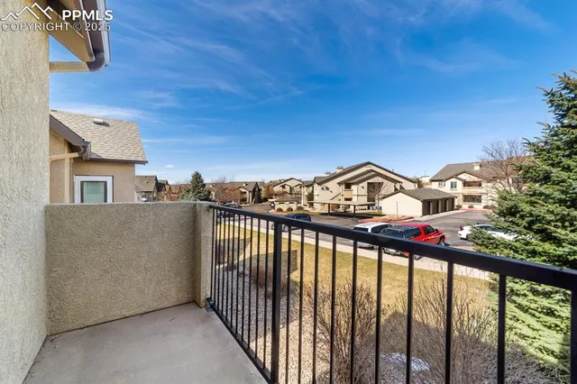 a view of a balcony with an outdoor space