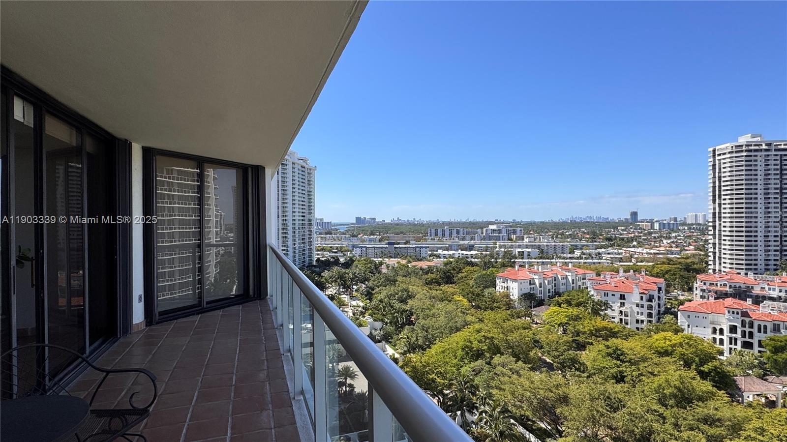 4000 Island Boulevard, Unit 1703 Aventura, FL 33160 - Photo 2 of 29 a view of a balcony with an outdoor space