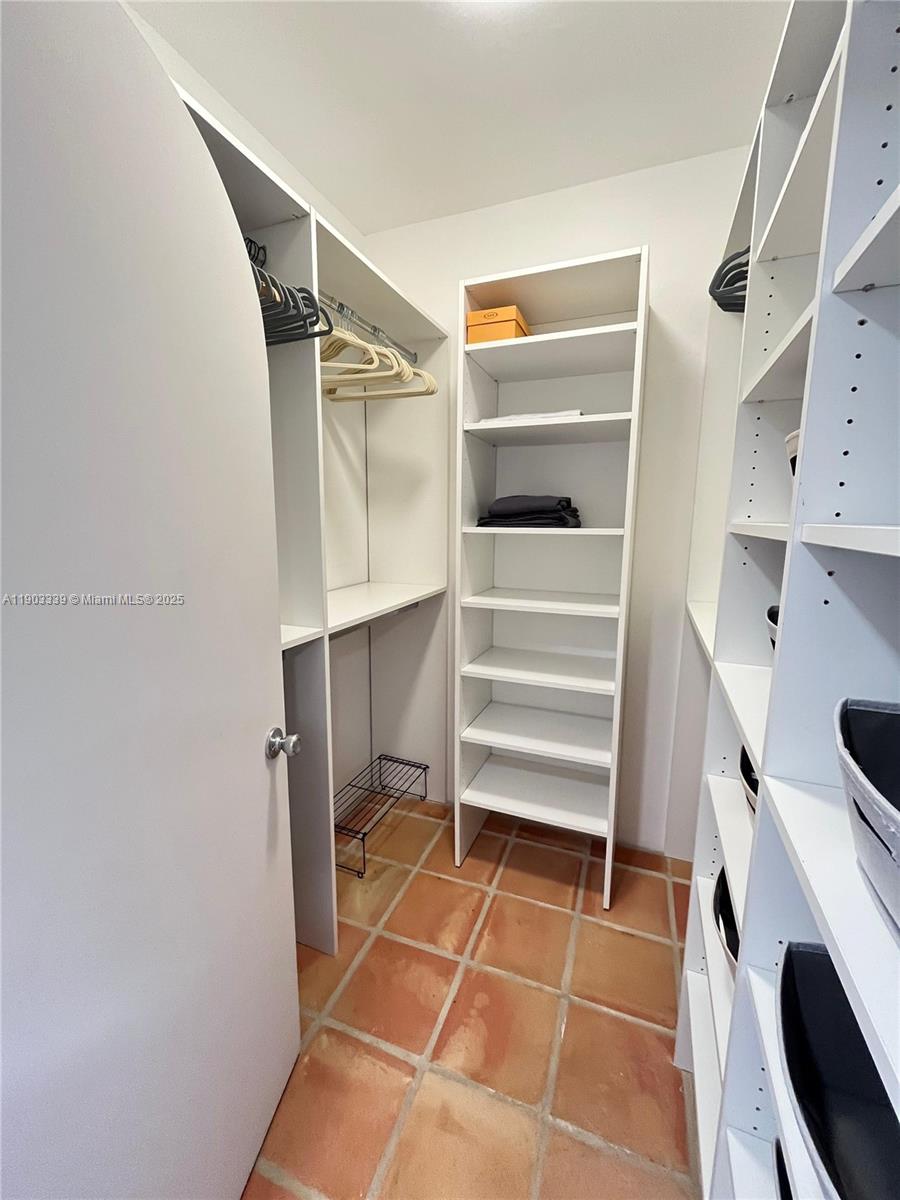 4000 Island Boulevard, Unit 1703 Aventura, FL 33160 - Photo 22 of 29 a room with storage and utility