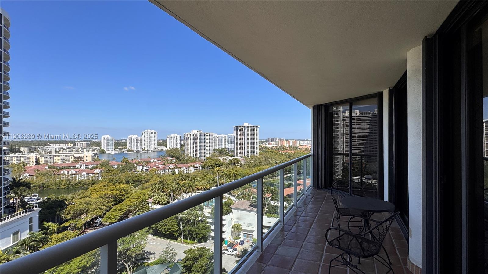 4000 Island Boulevard, Unit 1703 Aventura, FL 33160 - Photo 3 of 29 a view of a city from a balcony