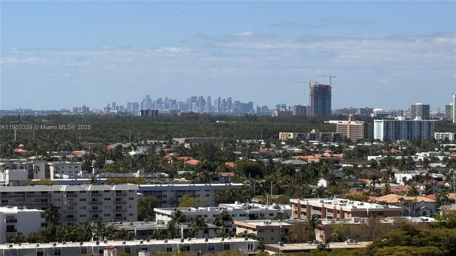 4000 Island Boulevard, Unit 1703 Aventura, FL 33160 - Photo 6 of 29 a view of a city with tall buildings