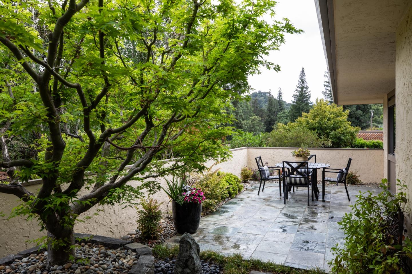22415 Rancho Deep Cliff Drive Cupertino, CA 95014 - Photo 24 of 33 a view of a tables and chairs in the patio