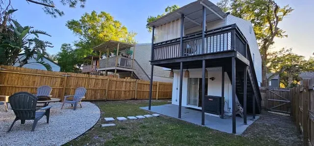 a balcony view with a seating space