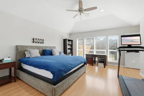 a bed room with a bed and a table