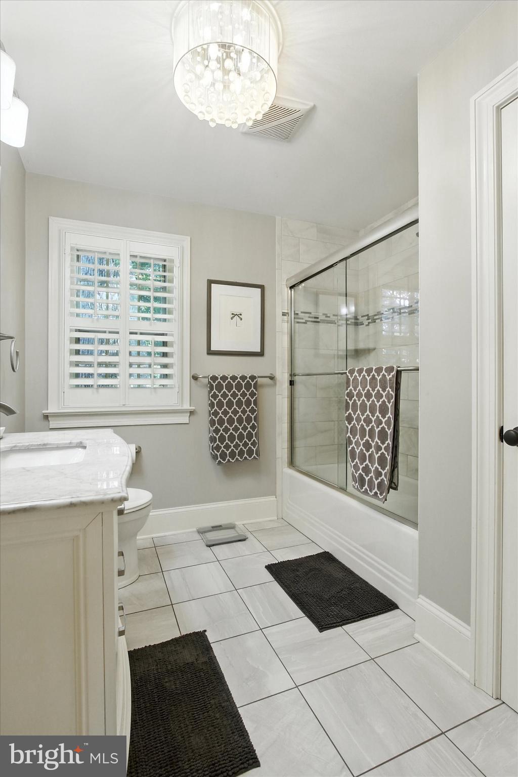 830 Westminster Avenue Hanover, PA 17331 - Photo 27 of 43 a view of a bathroom with a sink a window and a mirror