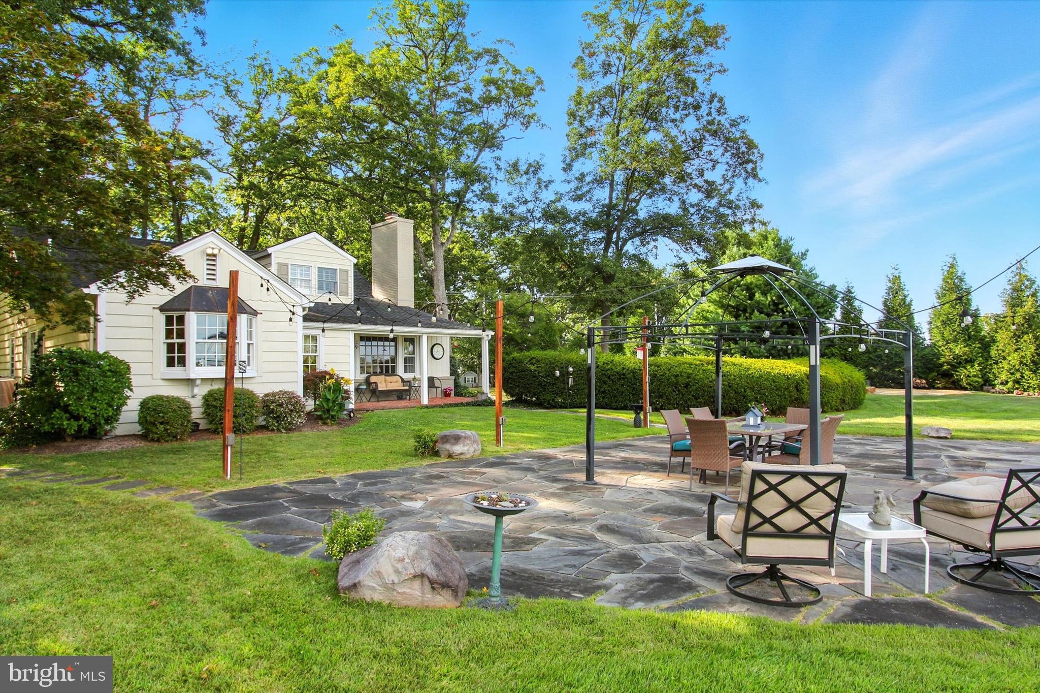 830 Westminster Avenue Hanover, PA 17331 - Photo 7 of 43 a view of a patio with a table chairs and a slide