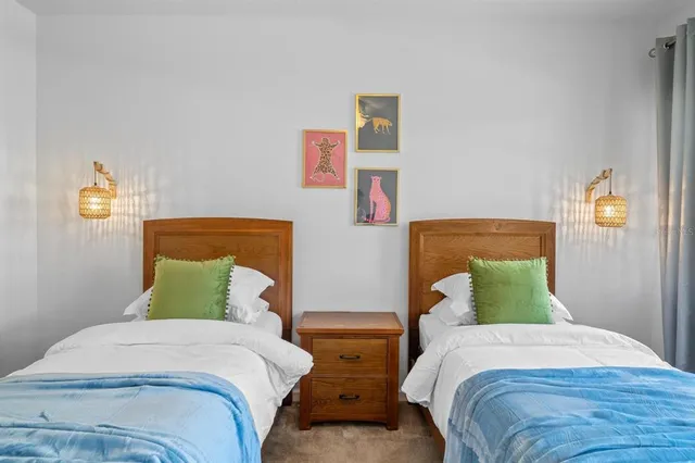 a bathroom with a sink a toilet and shower curtain