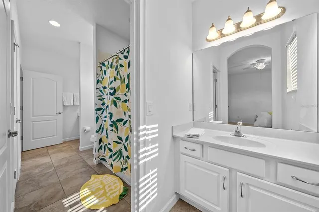 a swimming pool with chairs