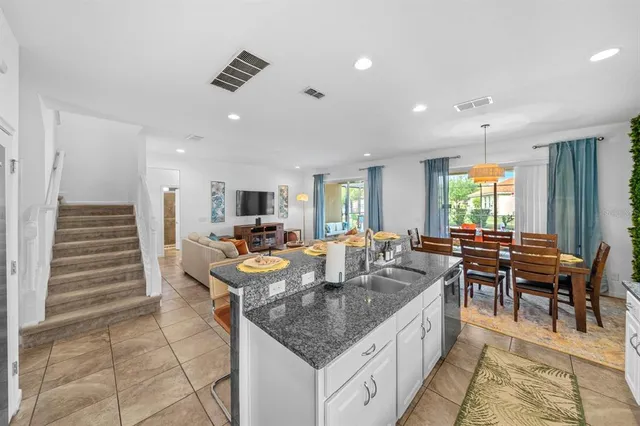 a view of a livingroom with furniture and dining area