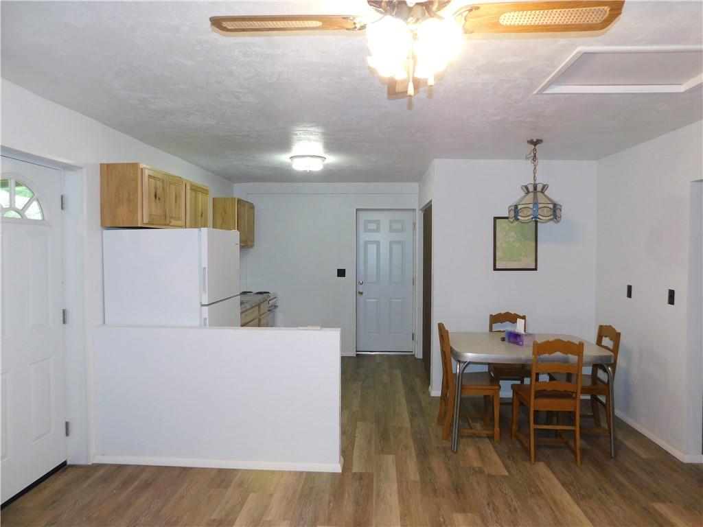 367 Pike School Road Markleysburg, PA 15459 - Photo 11 of 16 a living room with furniture and a table