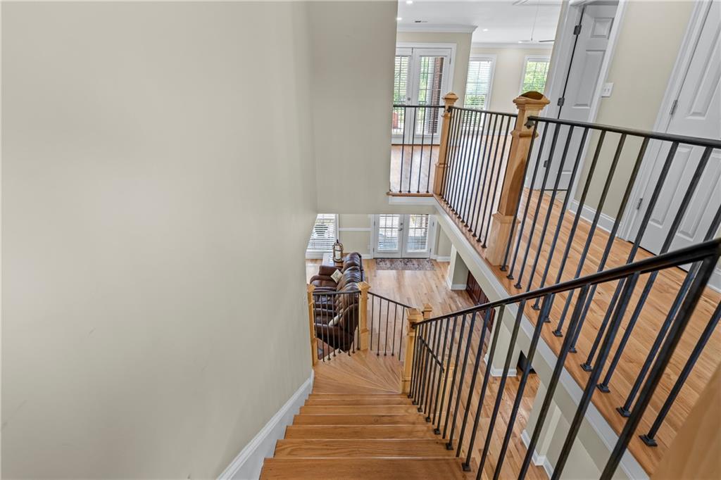 175 Tom Jones Road Kingston, GA 30145 - Photo 54 of 140 a view of staircase with wooden floor and a window