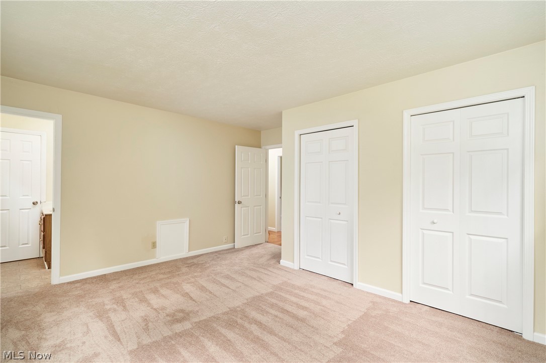 3201 Ridgewood Road Fairlawn, OH 44333 - Photo 10 of 23 Primary Bedroom Opens to Half Bath